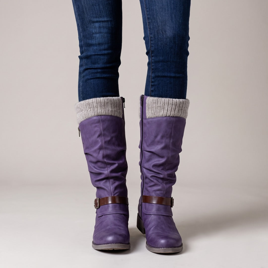 Greta boots in purple, worn with jeans
