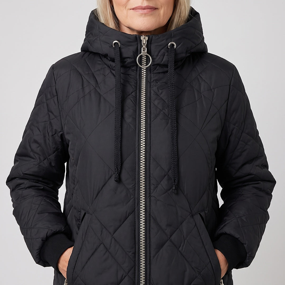 Rolande hooded jacket in black, close-up of the collar and zip