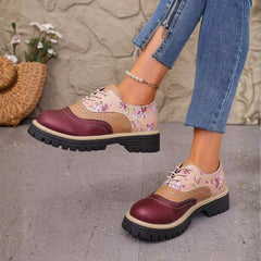 Rosette oxfords in black