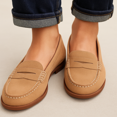 Colette penny loafers in tan, worn with cuffed jeans