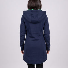Nora coat in blue, back view with the hood up
