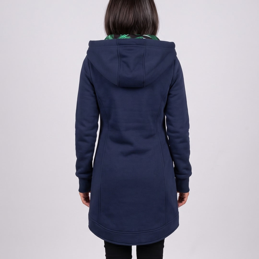 Nora coat in blue, back view with the hood up