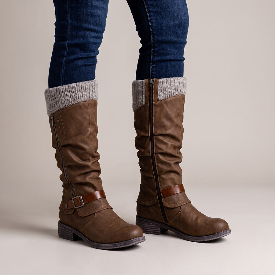 Greta boots in brown, worn with jeans