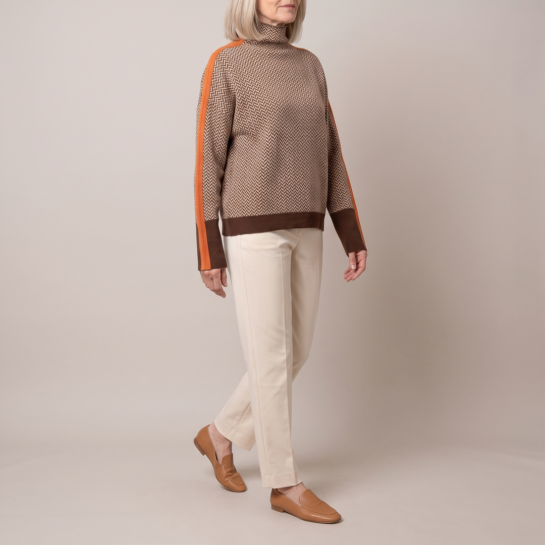 Malou turtleneck sweater in brown and orange, walking