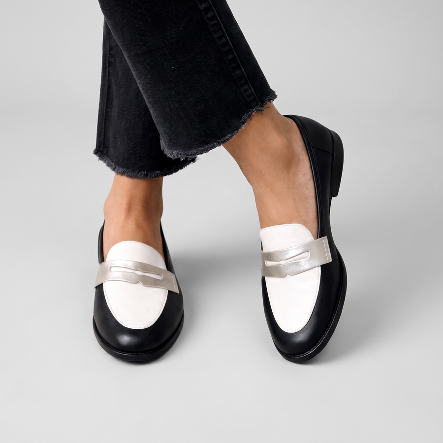 Willow two-tone penny loafers with metallic strap worn