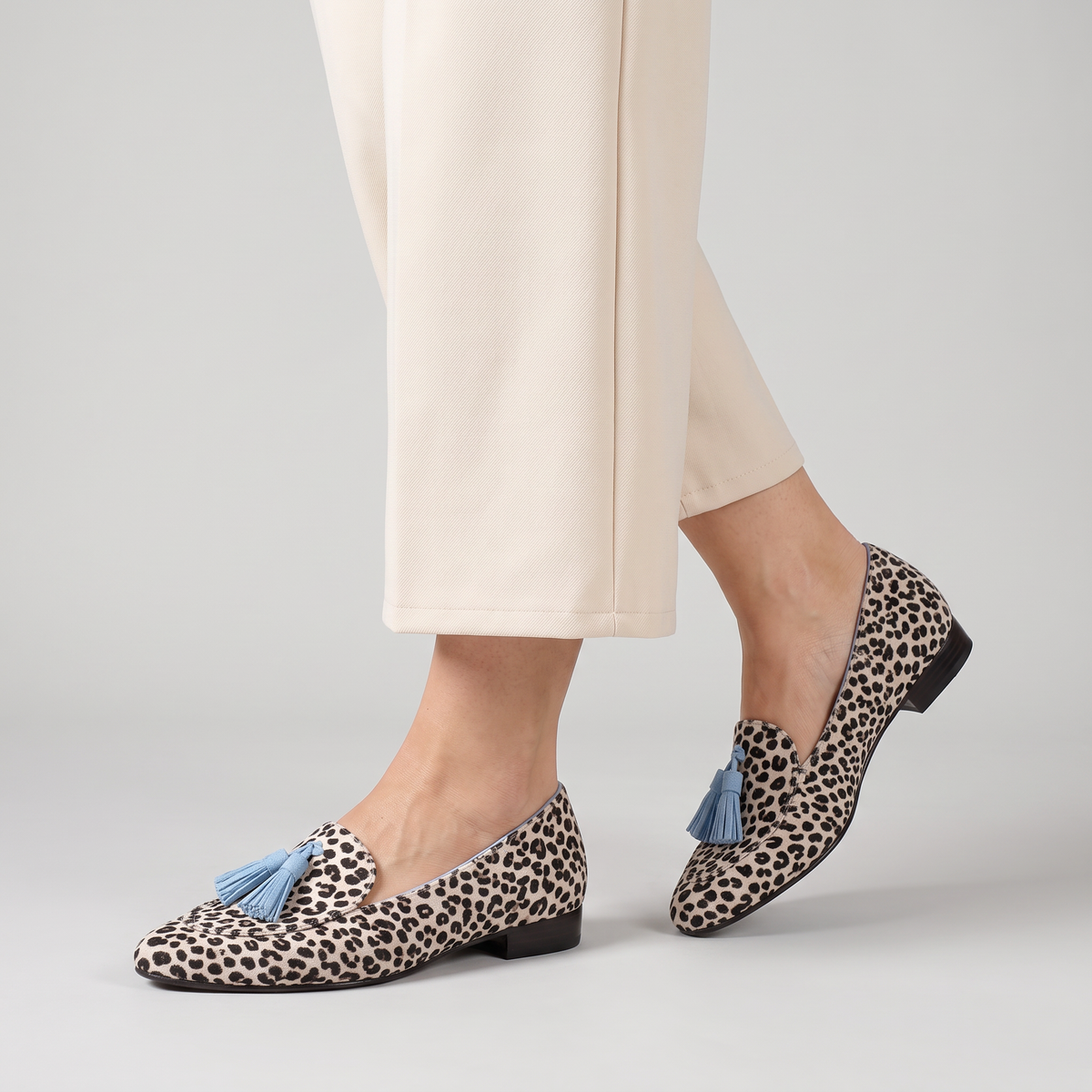 Gwenn leopard print loafers with double tassel worn