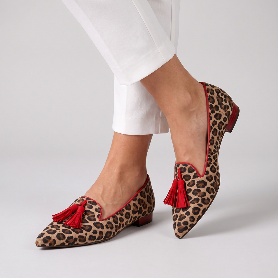 Gelly leopard pointed flats with tassel worn