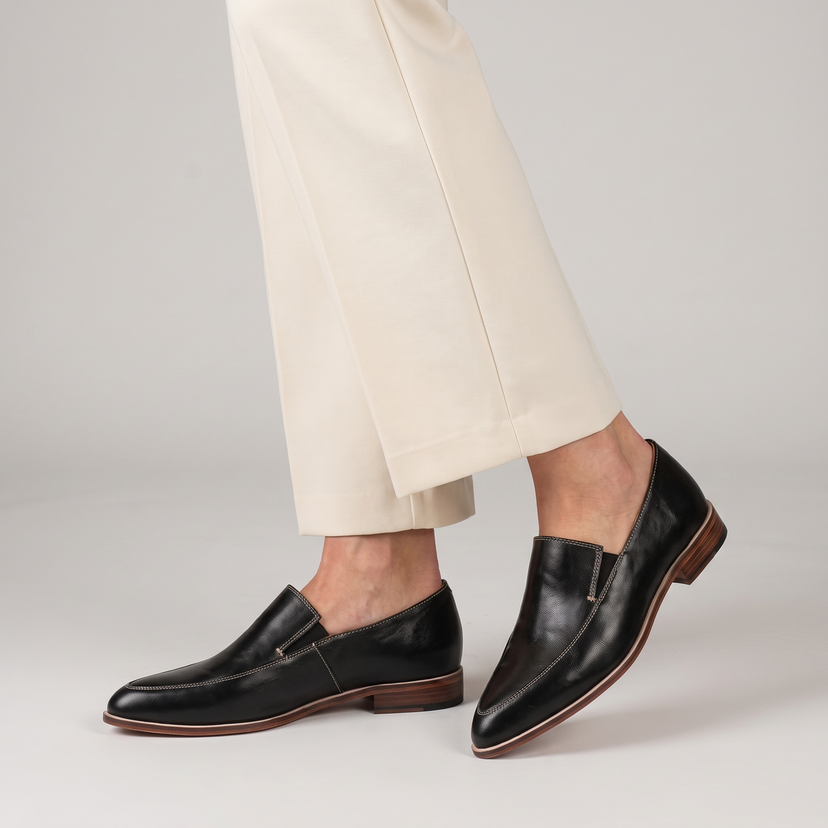 Thalia pointed slip-on shoes with contrast stitching worn