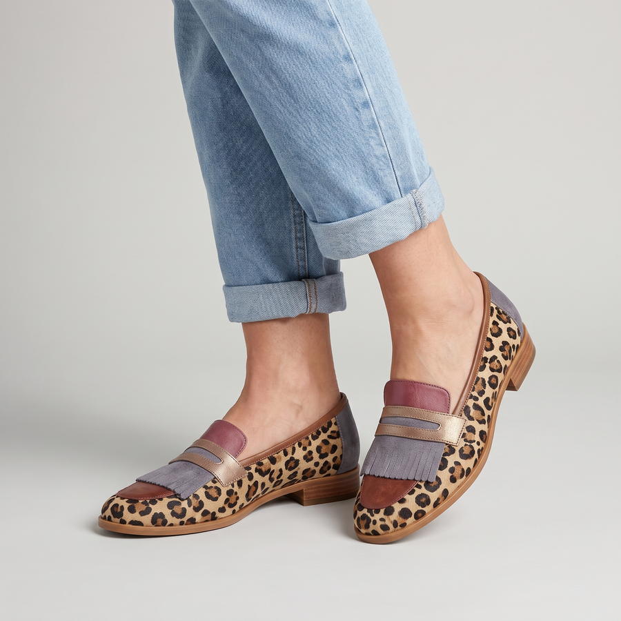 Zelda leopard penny loafers with fringe worn