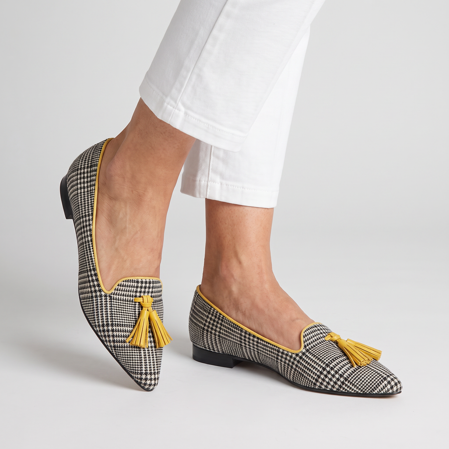 Odessie check flats with tassel and small heel worn