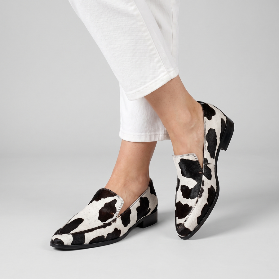 Becca pointed spotted slip-on shoes worn