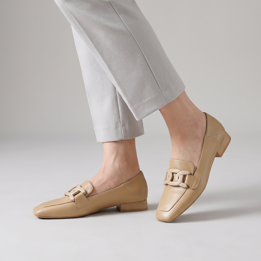 Monika square toe loafers with chain detail worn