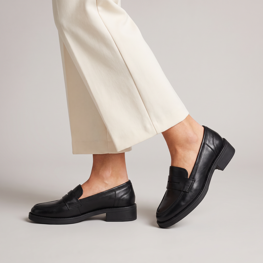 Evana classic penny loafers with sturdy sole worn