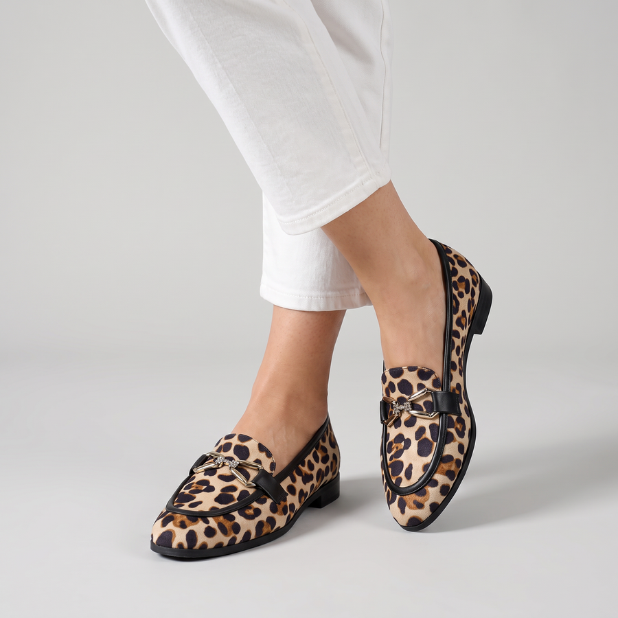 Geneva leopard loafers with sparkle buckle worn