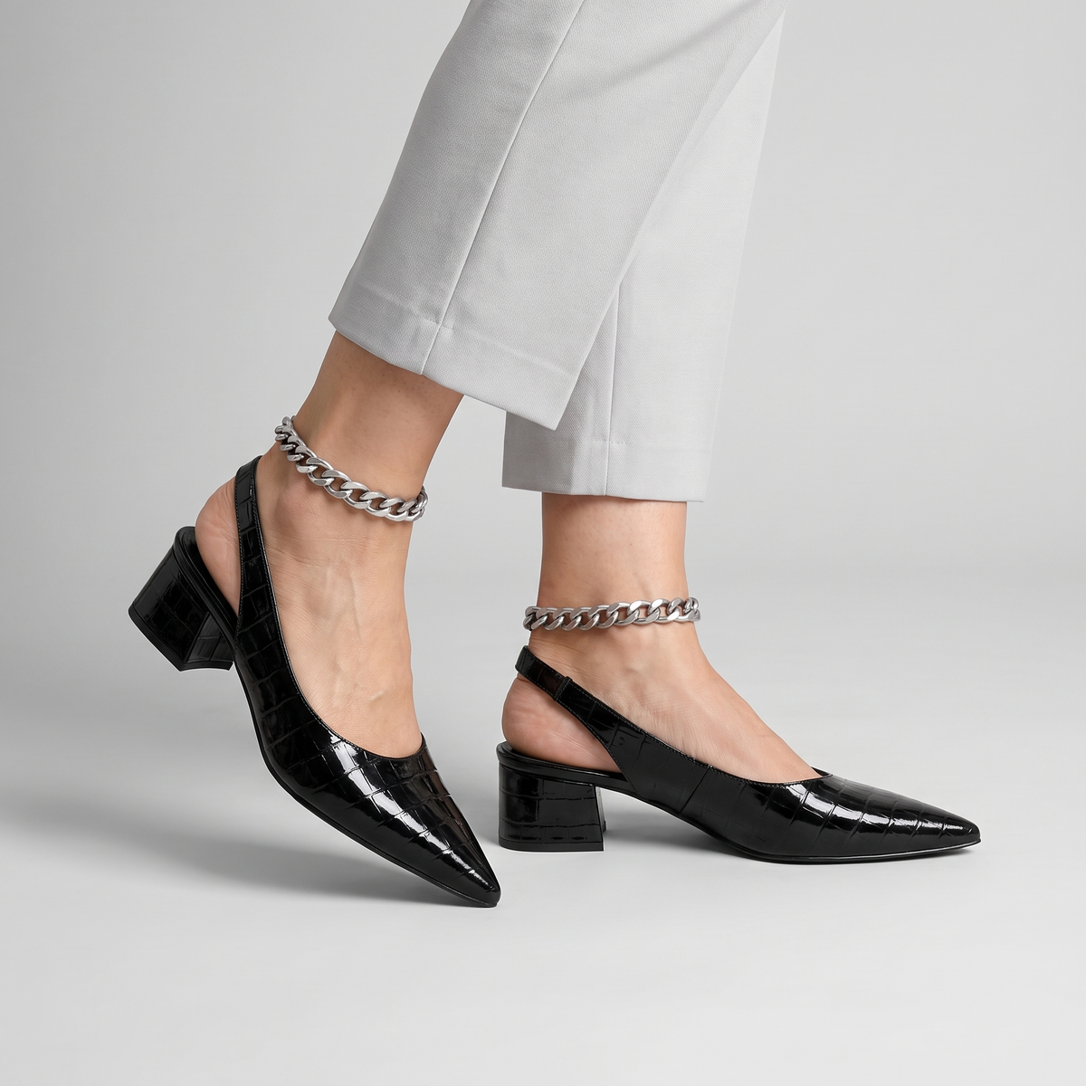 Lynn pointed slingback pumps with block heel worn